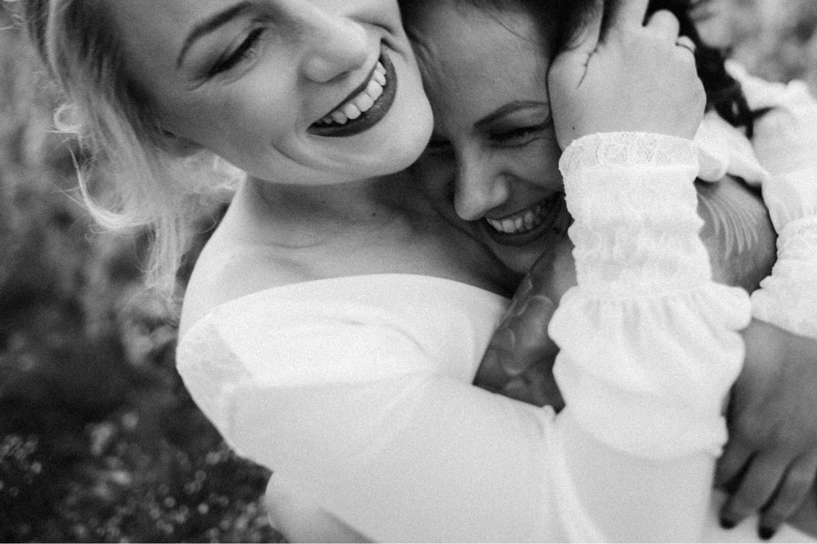 two brides laughing on their elopement wedding day in Croatia