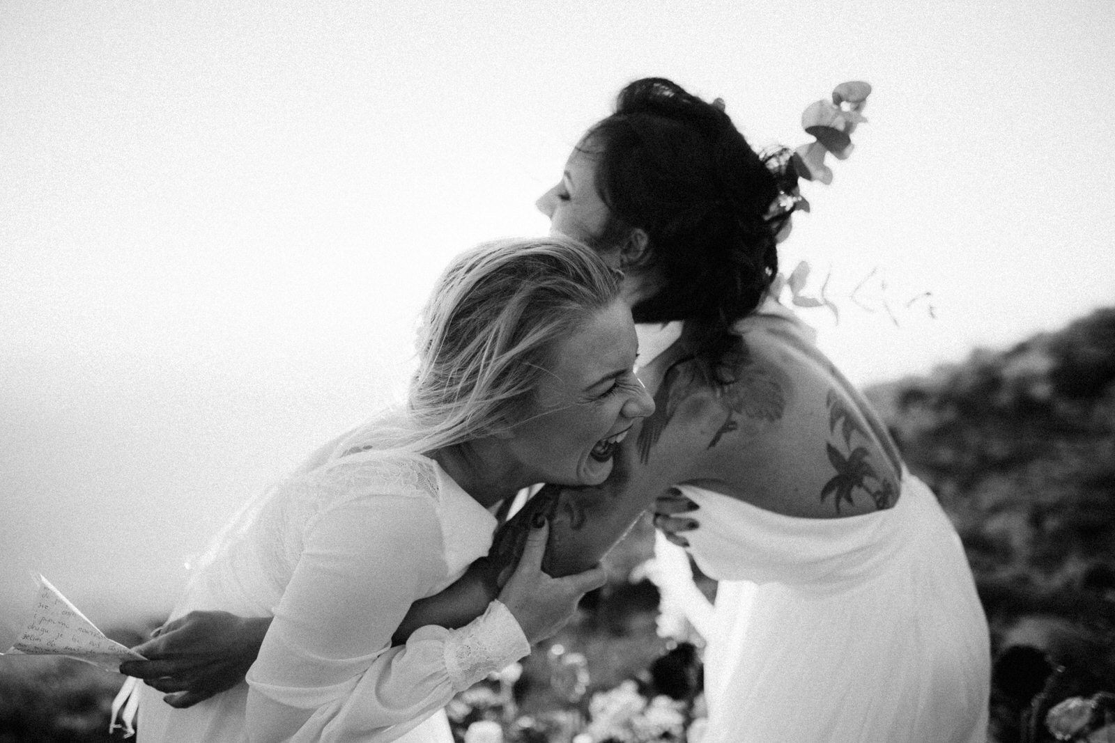 brides laughing on their wedding day in Croatia