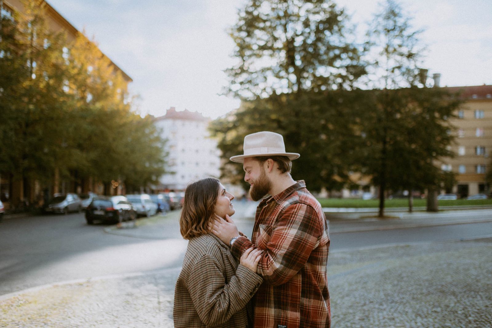 couple in love looking at each other in the streets of Berlin
